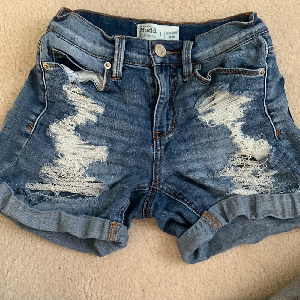 I am selling Mudd mid rise size 1 shorts in blue.